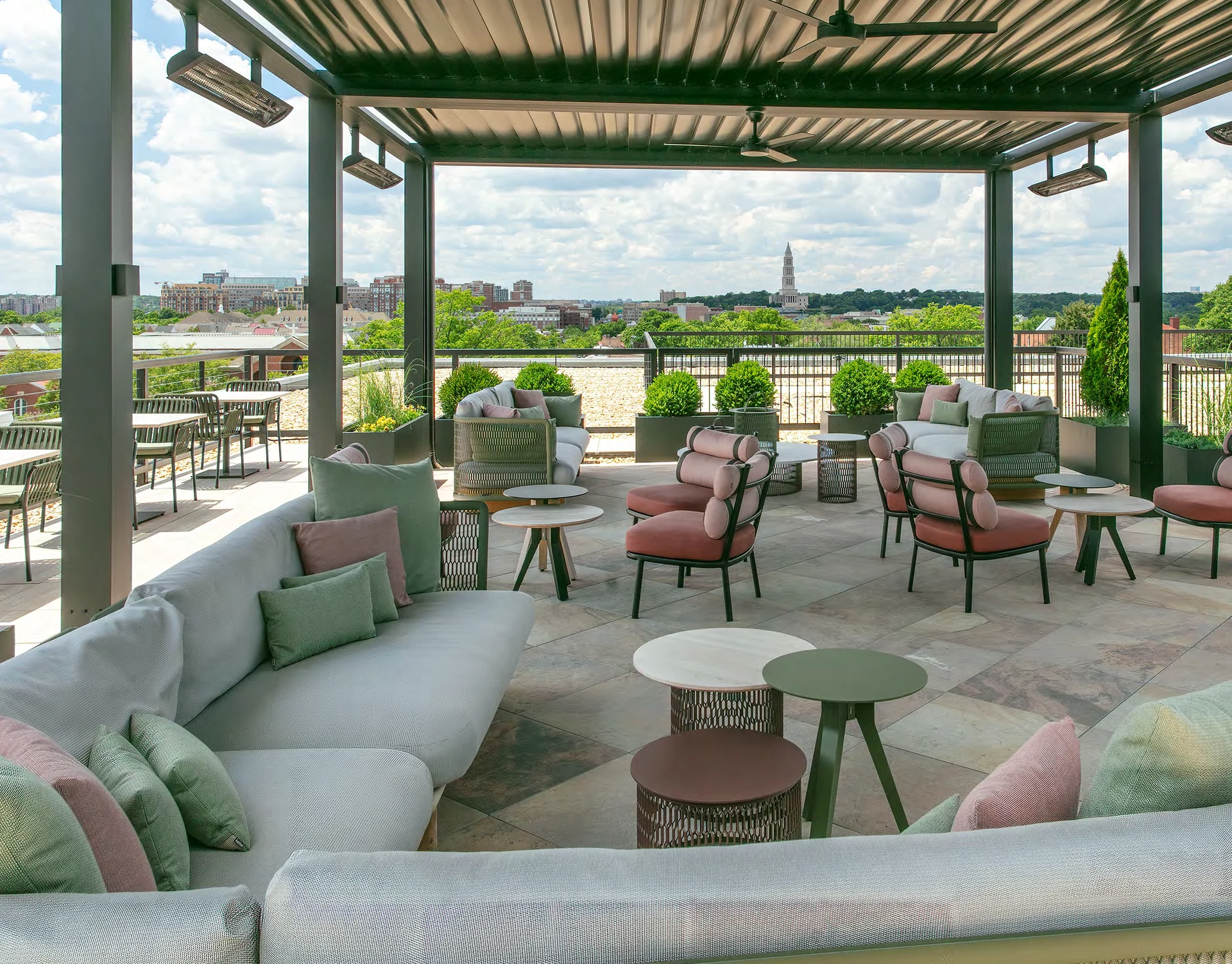 Furnished rooftop terrace beneath a pergola at 277 South Washington Street